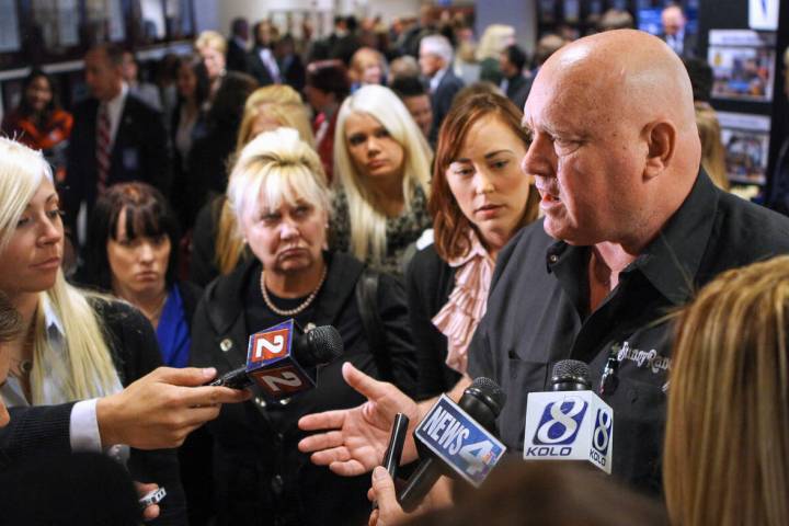 In this February 22, 2011 file photo, brothel owner Dennis Hof answers questions from the media ...