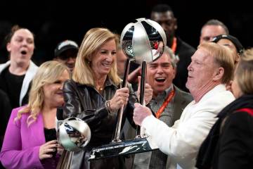 WNBA Commissioner Cathy Engelbert presents Las Vegas Aces owner Mark Davis with his team’s ch ...